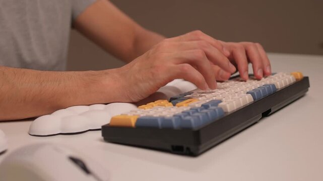 Keyboard setup showcase, Ergonomic mechanical keyboard display, Closeup of tactile switches on custom keyboard, Designer testing pastel keycaps with ergonomic wrist cushion setup