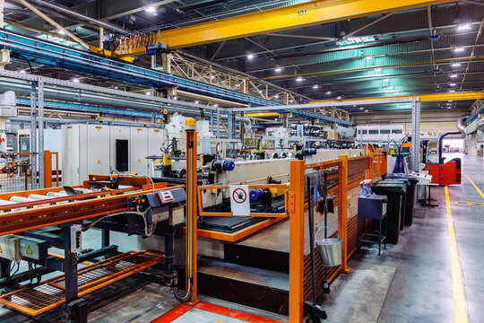 Metalworking factory production line. Production of metal profile parts
