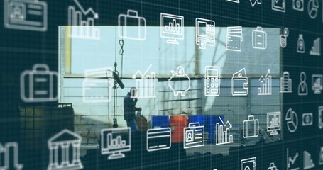 Inspecting man in dark workwear handling crane hook near blue drums in warehouse, icon overlay