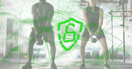Swinging two athletes wearing tank and tee doing kettlebell swings in gym, green S overlay
