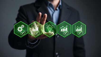 Businessman interacting with innovative technology icons on screen