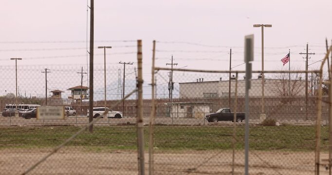 Chino, California, USA - March 1, 2025: Cloudy sun shines on the California Institution for Men State Prison Chino.