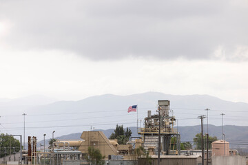 Cloudy day view of an cogeneration plant in the industrial district of Chino, California, USA.