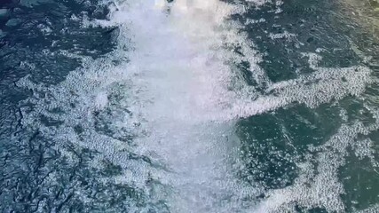 A clear view of a shallow tubewell in a rural setting, showing water pumping for irrigation, traditional farm infrastructure, and sustainable agriculture practices, highlighting countryside life and n