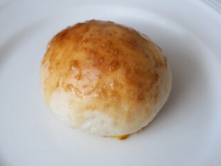 Homemade Japanese Bread Roll Made with Bread Machine on White Plate