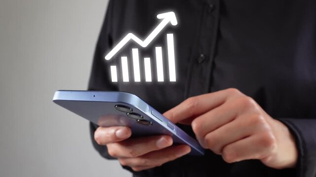 Close-up of a businesswoman's hands on her smartphone with a bar graph animation and an upward-pointing arrow