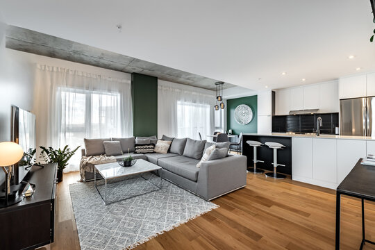 High-quality photo set of a contemporary urban apartment highlighting modern architecture, minimalist interior design, and functional living spaces. The series includes exterior facade, building entra