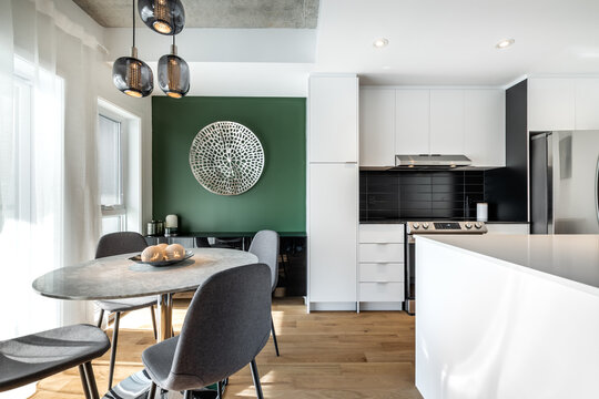 High-quality photo set of a contemporary urban apartment highlighting modern architecture, minimalist interior design, and functional living spaces. The series includes exterior facade, building entra