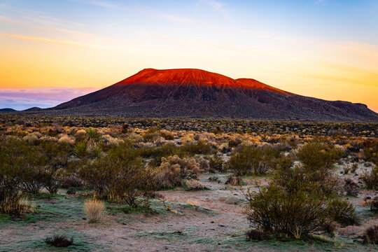 Cinder cone volcanoes at sunset Mojave Desert