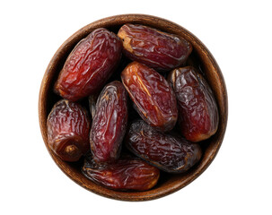 Obraz premium Top-down view of brown dates piled inside a small wooden bowl on black
