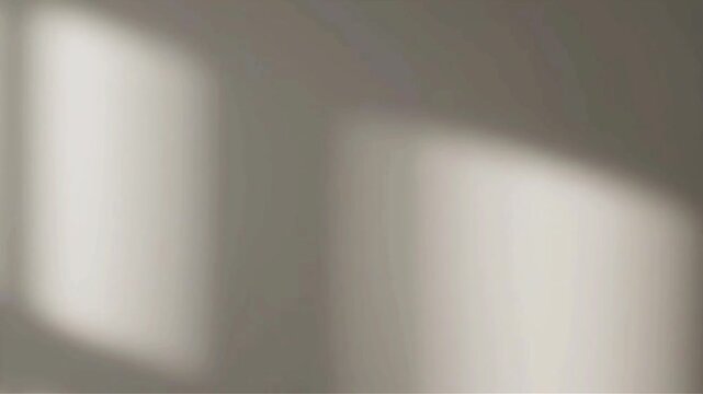 Aesthetic cinematic light rays moving across a neutral wall to create a serene atmosphere, perfect for stylish background video loops