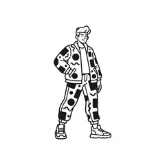 Stylish Man in Patterned Outfit Standing Confidently.