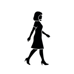 Woman walking in silhouette.