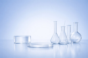 AI generated minimal scientific laboratory glassware with clear beakers flasks and petri dishes on clean blue background representing chemistry biotechnology research and precision science