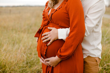 pregnant woman with her husband