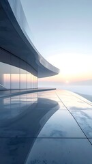 Modern, curved building overlooking a reflective surface and a misty horizon