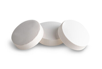 close-up shot of a heap of white round pills or supplement tablets. Isolated on a clean white background, ideal for medical pharmacy branding, healthcare ads, and clinical research