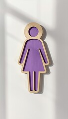 A purple female symbol on a white background, representing women's rights and awareness.