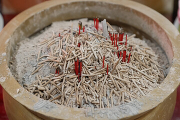 Close Up Shot of Burnt Insence Embedded in Ash