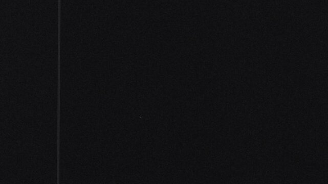 analog vintage video overlay - dust and scratches with film light leaks and 16mm noise effects - loop footage type b