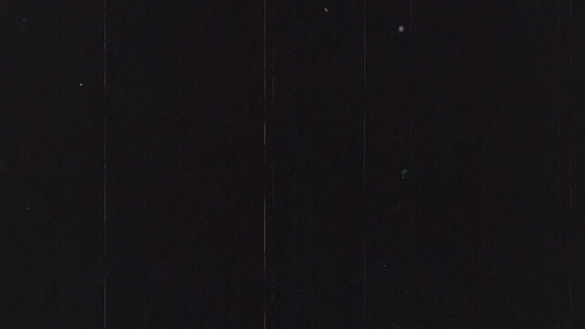analog vintage video overlay - dust and scratches with film light leaks and 16mm noise effects - loop footage 4k editing video