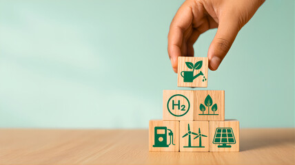 Building a sustainable future with renewable energy and green technology concepts represented by illustrated wooden blocks