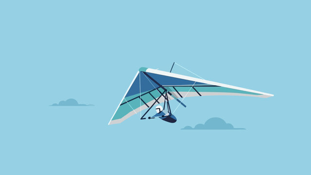 Hang glider soaring through the clear blue sky with clouds below.