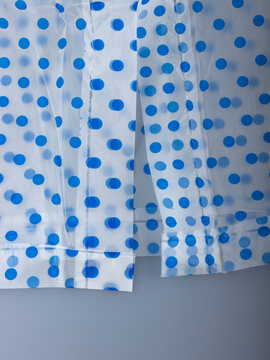 Close-Up of Blue Polka-Dot Waterproof Poncho Edge