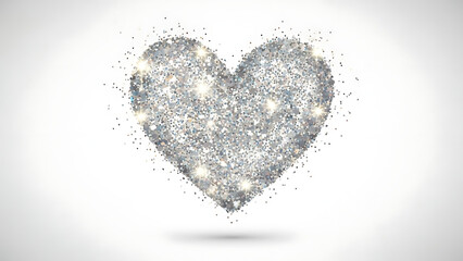 Glittering heart shape made of tiny sparkling particles