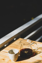 A cup of ice americano in coffee shop.