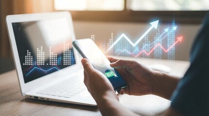 A person analyzing financial data on a smartphone with a laptop nearby, surrounded by rising graph animations indicating growth and success in a modern office setting.