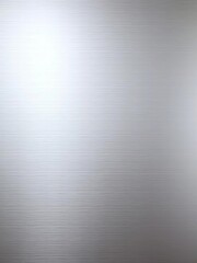 Brushed aluminum surface with subtle horizontal lines, reflecting light minimally,  modern,  gray