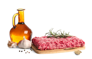 Fresh ground meat with rosemary, garlic, bay leaves and jug of oil on white background