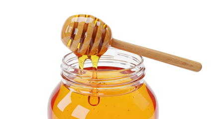 Honey dipper in a jar of honey