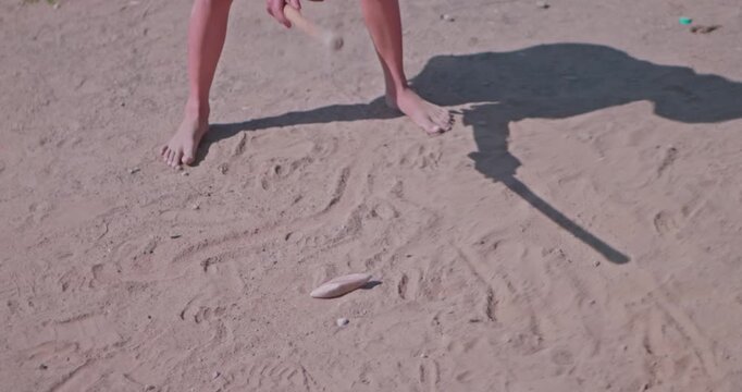 Traditional Indian Game Gilli Danda Played by Village Girl