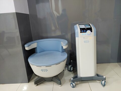 Emsella machine at hospital, a non-invasive, chair device that uses High-Intensity Focused Electromagnetic (HIFEM) technology to strengthen pelvic floor muscles, treating urinary incontinence