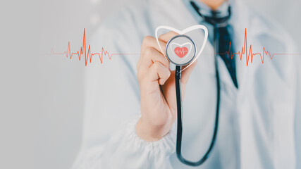 Doctor holding stethoscope with heart icon and ECG line, examination cardiogram represent cardiology care, heart monitoring, medical diagnosis, healthcare technology, modern patient health services.