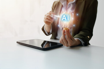 Business professional interacts with glowing AI concept symbol, representing artificial intelligence innovation, smart solutions and modern technology supporting business decision making.