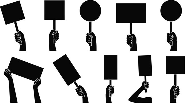 Hands holding protest signs and placards in black silhouette