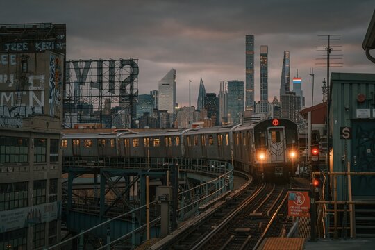 Approaching 7 Subway train and view of the Manhattan skyline at Queensboro Plaza Station, Queens, New York City