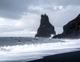 A dramatic coastal scene featuring a striking rock formation on a black sand beach, with waves crashing under a cloudy sky