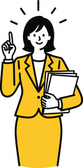 Smiling businesswoman in a yellow suit pointing upwards having a brilliant idea while holding documents.