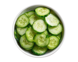 Bowl of sliced cucumbers, light reflects off the shiny, fresh circles