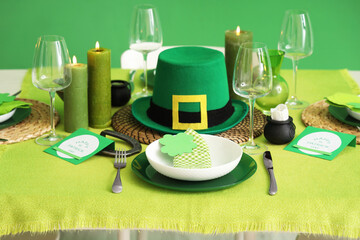 Festive table serving with leprechaun's hat. St. Patrick's Day celebration