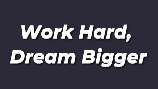 Motivational quote with work hard dream bigger text on a dark background inspiring people to achieve their goals and strive for success every day consistently.