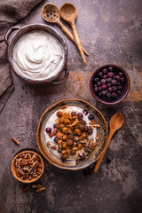 Organic Greek yogurt with pecan nuts, blueberries and cinnamon