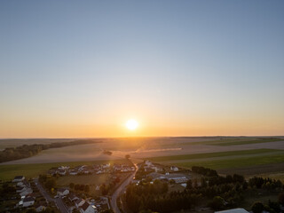 Bergnicourt, Rethel, Ardennes, Grand-Est, France, August, 28th, 2025, A beautifully tranquil sunset is illuminating the fields and homes, encapsulating the stunning beauty of nature