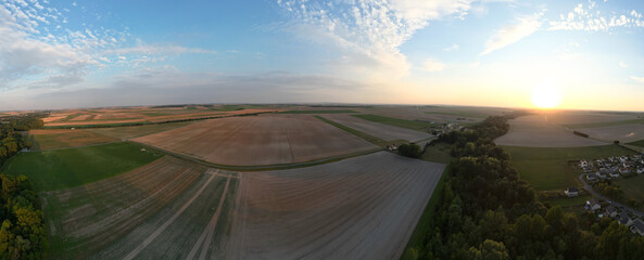 Bergnicourt, Rethel, Ardennes, Grand-Est, France, August, 28th, 2025,Enjoy a breathtaking sunrise view of vibrant fields, showcasing rich textures and serene landscapes around you