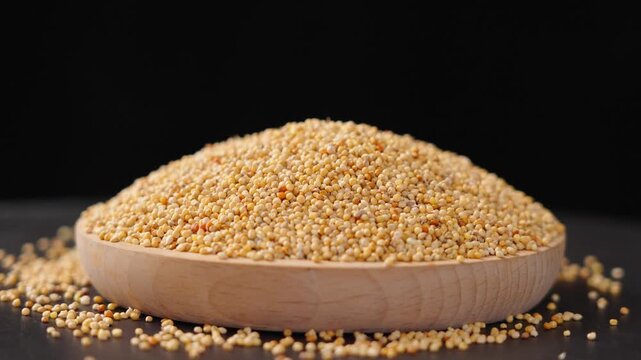 closeup of unpeeled millet grain background