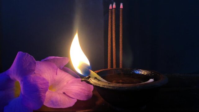 oil lamps lit for the gods in an Asian Buddhist temple. Lord Buddha, spiritual, meditative, Diwali festive